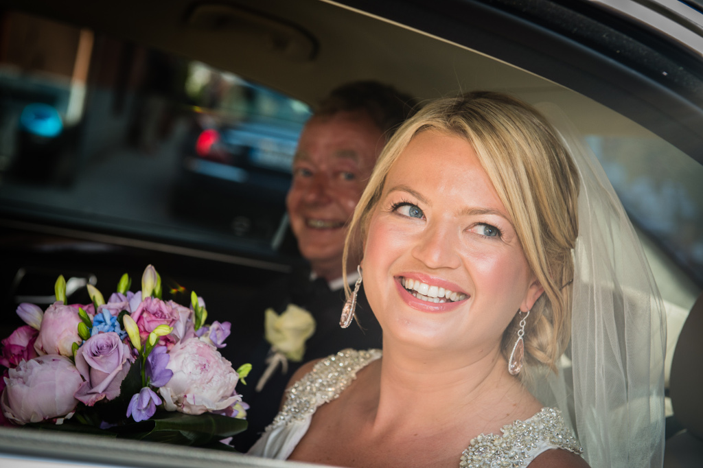 Bride arrives to wedding ceremony