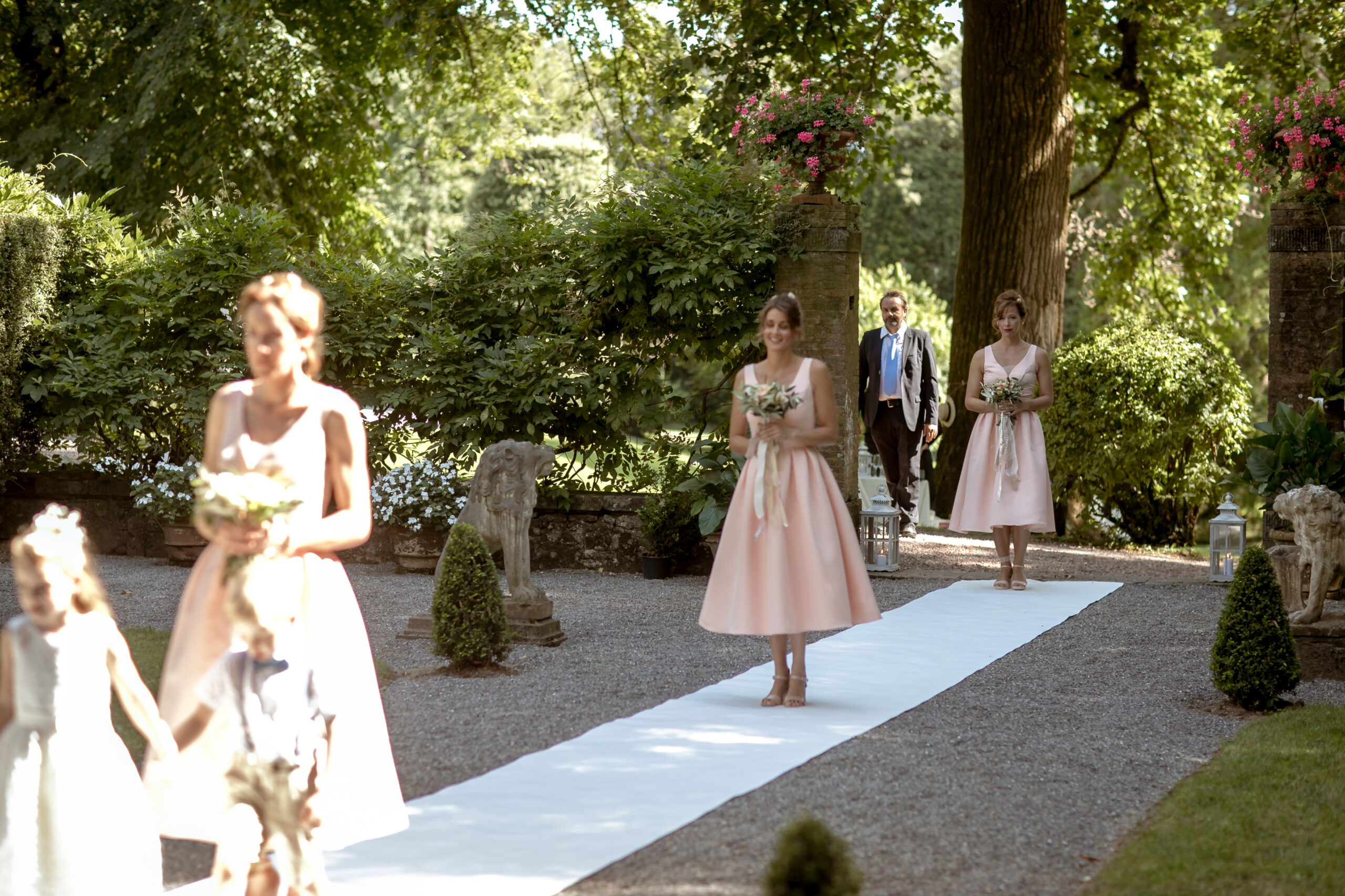 Bridesmaids walking down the aisle