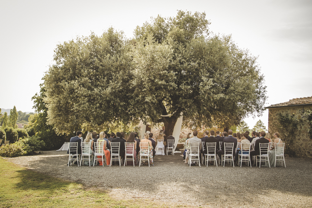 Wedding ceremony under the tree of life in Tuscany