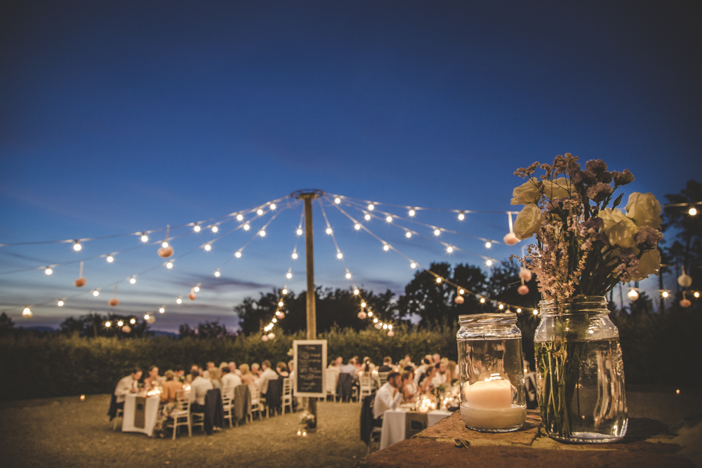 Wedding dinner under the Tuscan sky and string lights